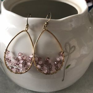 Hoop earrings with pink and purple rhinestones